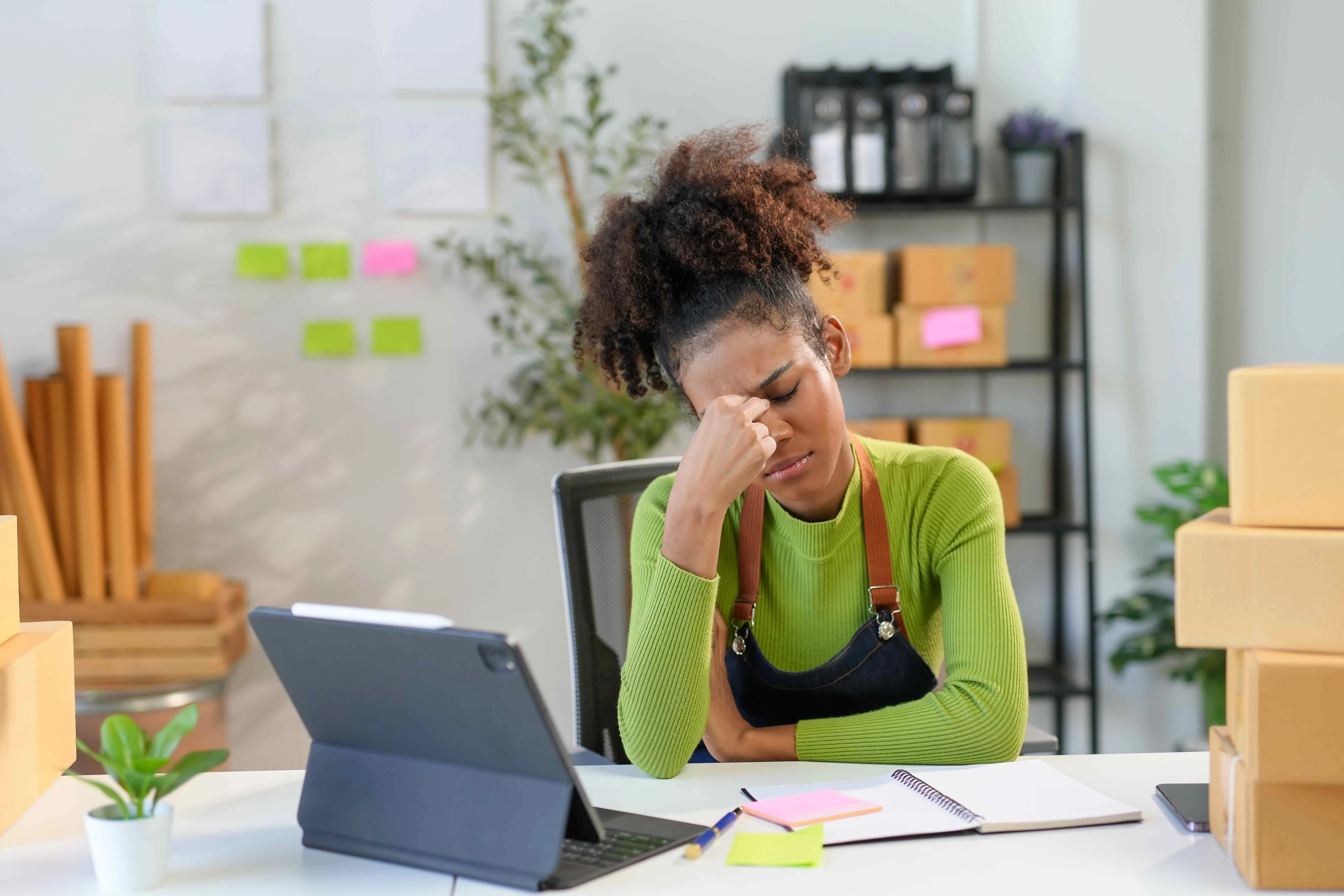 Struggling small business owner overwhelmed with enquiries